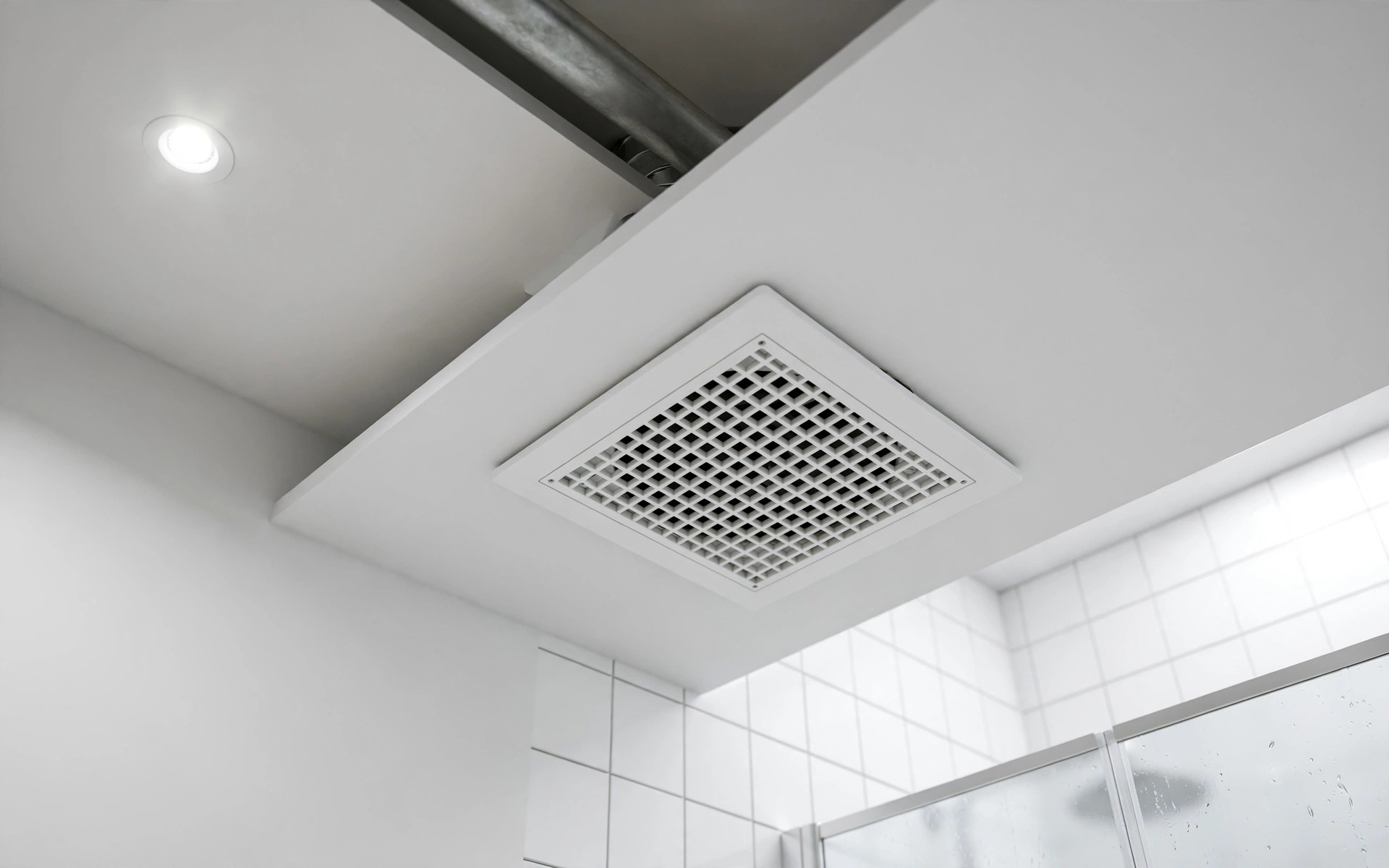 Close-up concept render of a square exhaust fan grille integrated into a white bathroom false ceiling near the shower corner