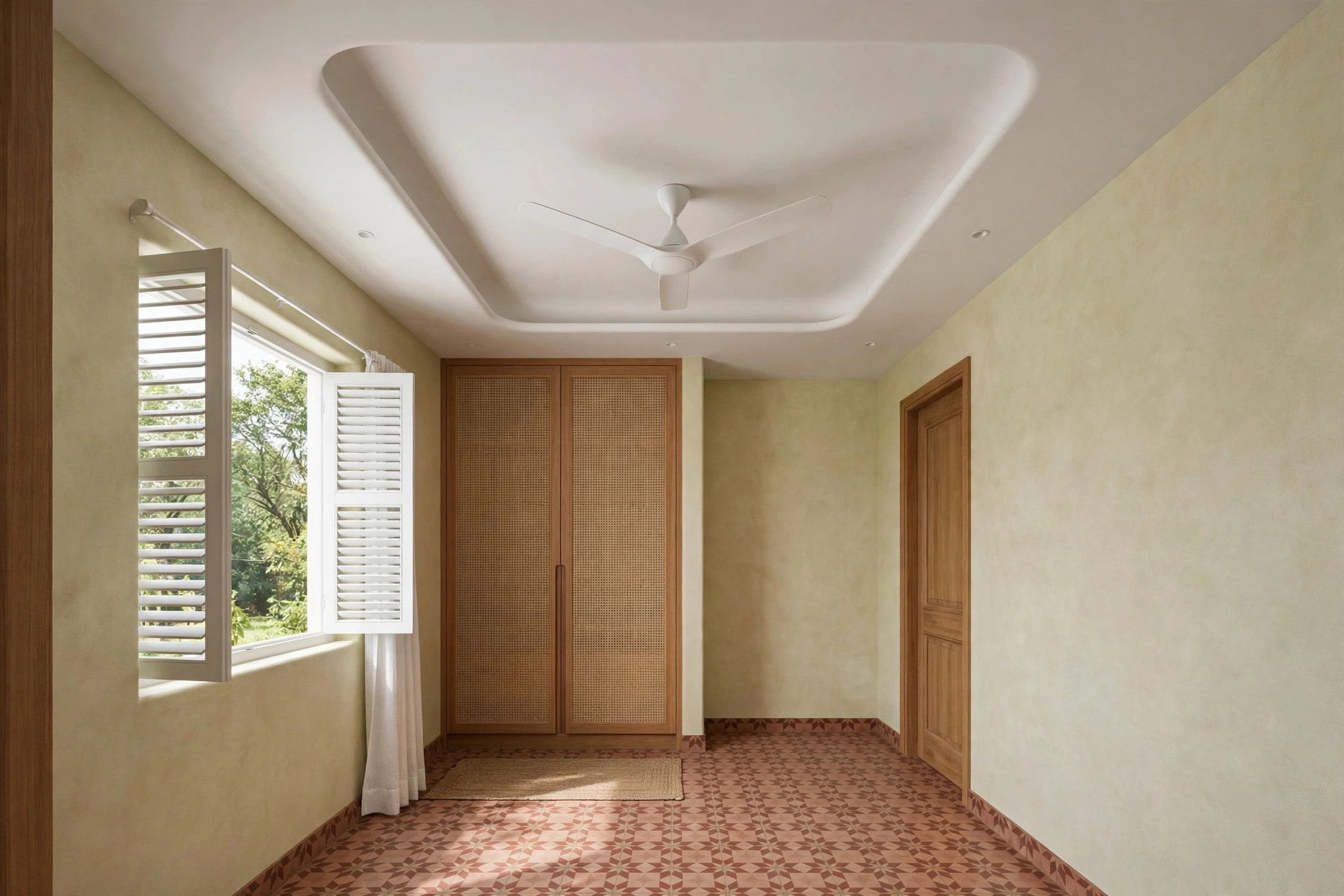 White tray ceiling with a ceiling fan fitted in the centre of the recess