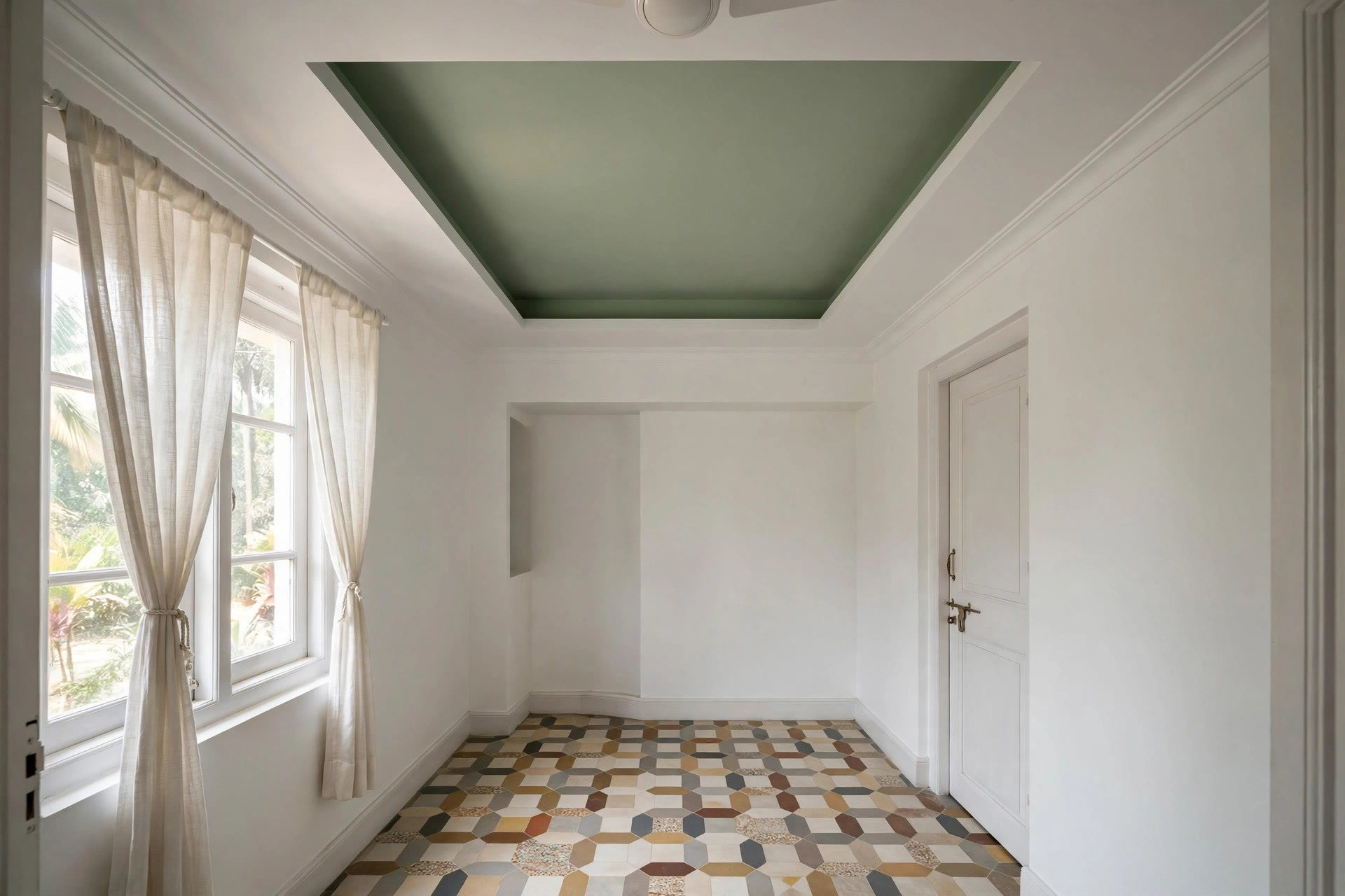 Two-tone tray ceiling with a soft green accent panel inside the recess