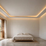 Bedroom with a POP perimeter border and warm cove lighting