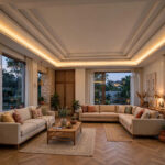 L-shaped hall with layered gypsum tray ceiling and warm cove lighting