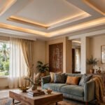 Hall with a gypsum tray false ceiling and warm cove lighting