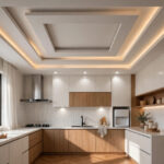 Modern Indian kitchen with a layered 2026-style false ceiling and recessed LED lighting