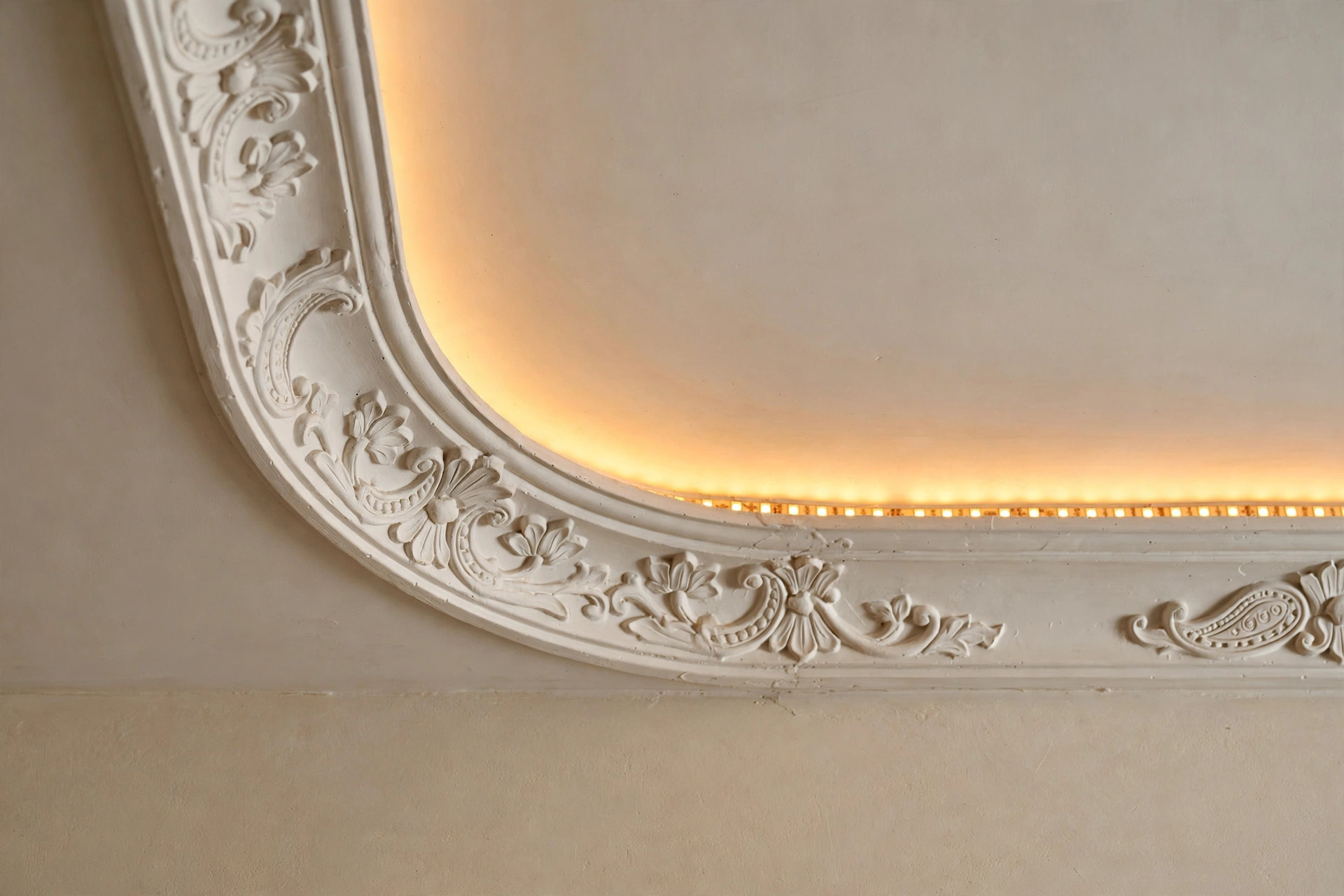 Close-up of a POP cove detail with warm LED strip