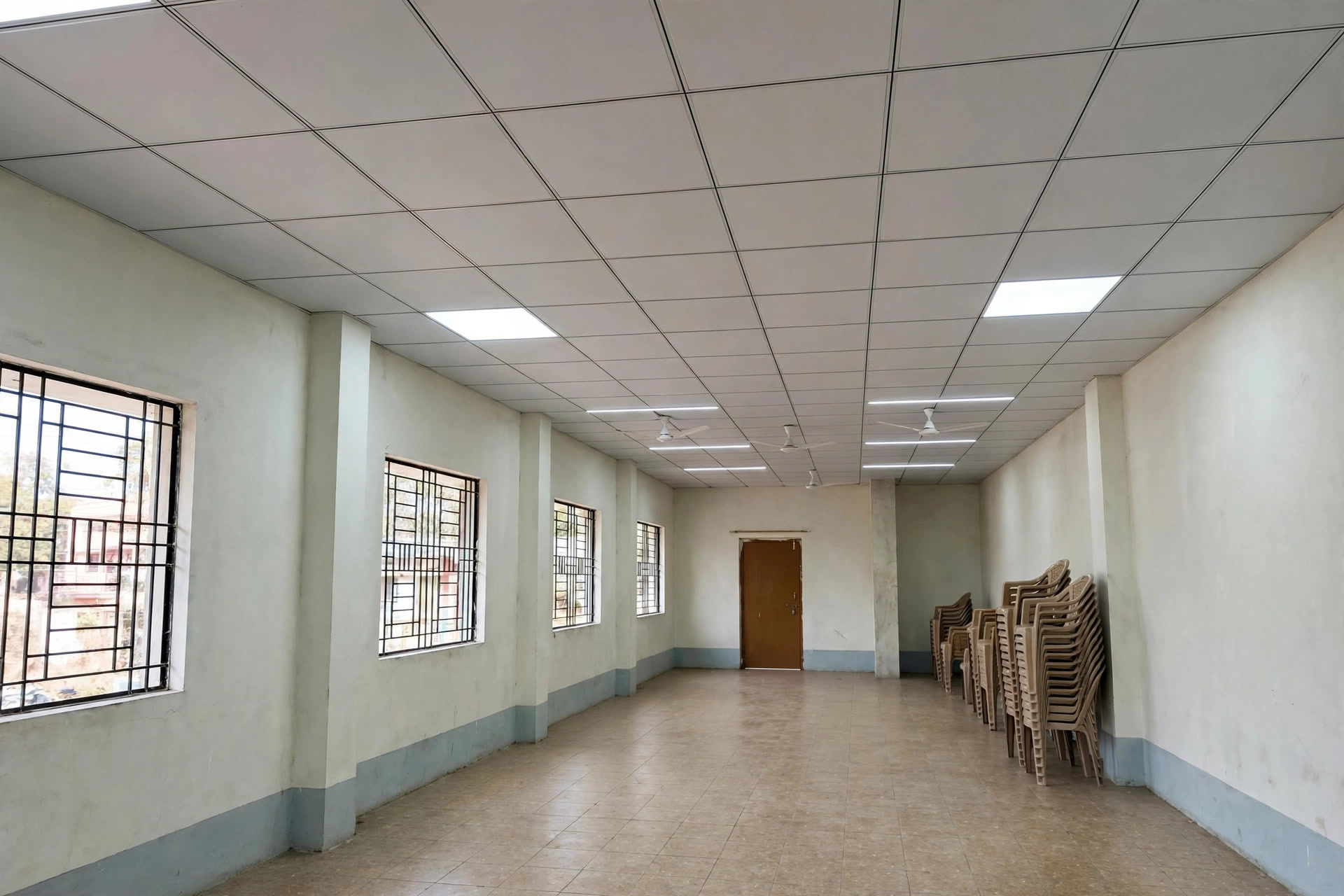Hall with a clean white PVC panel ceiling and simple lighting