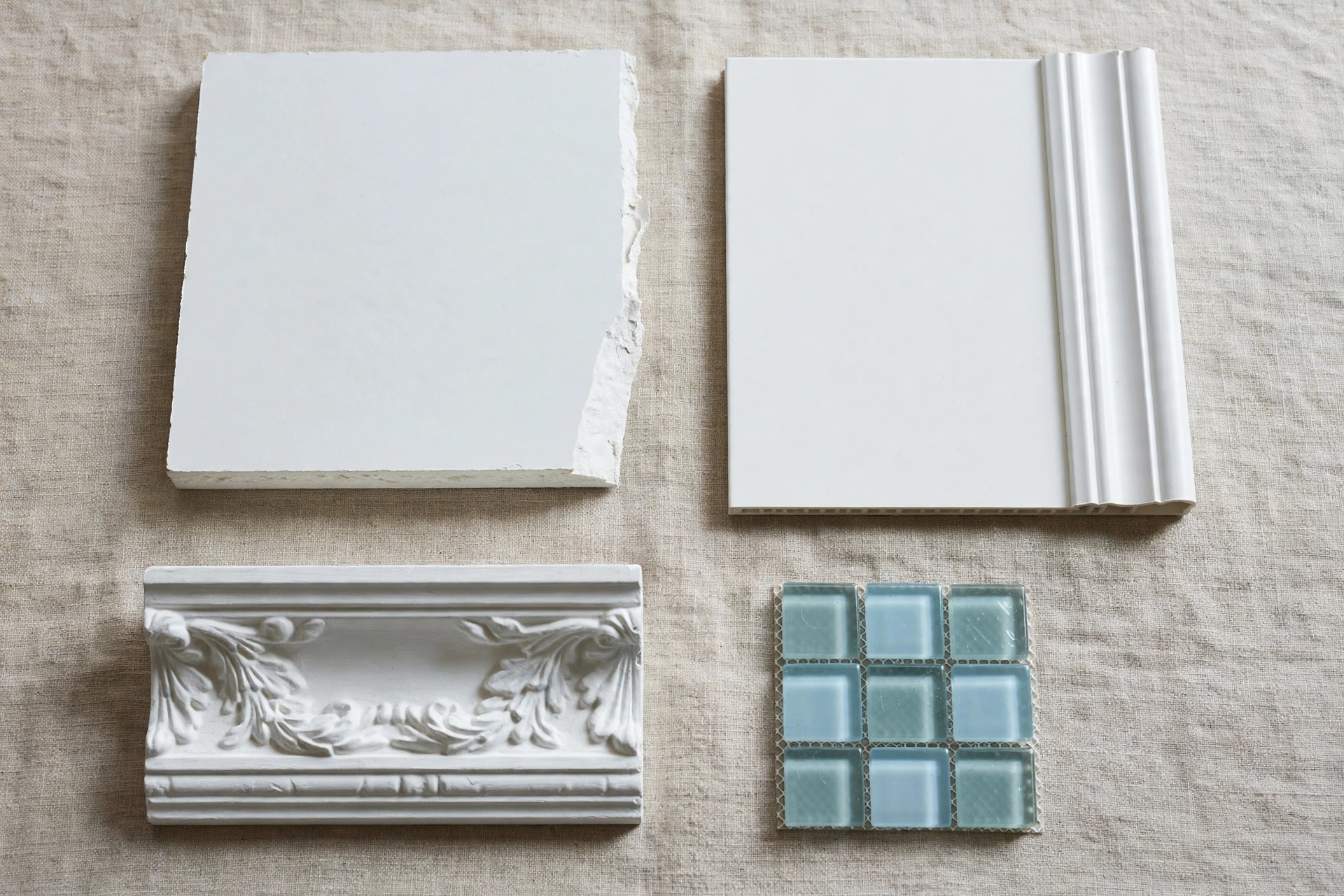 Material samples for compact-space ceilings: gypsum, PVC, POP