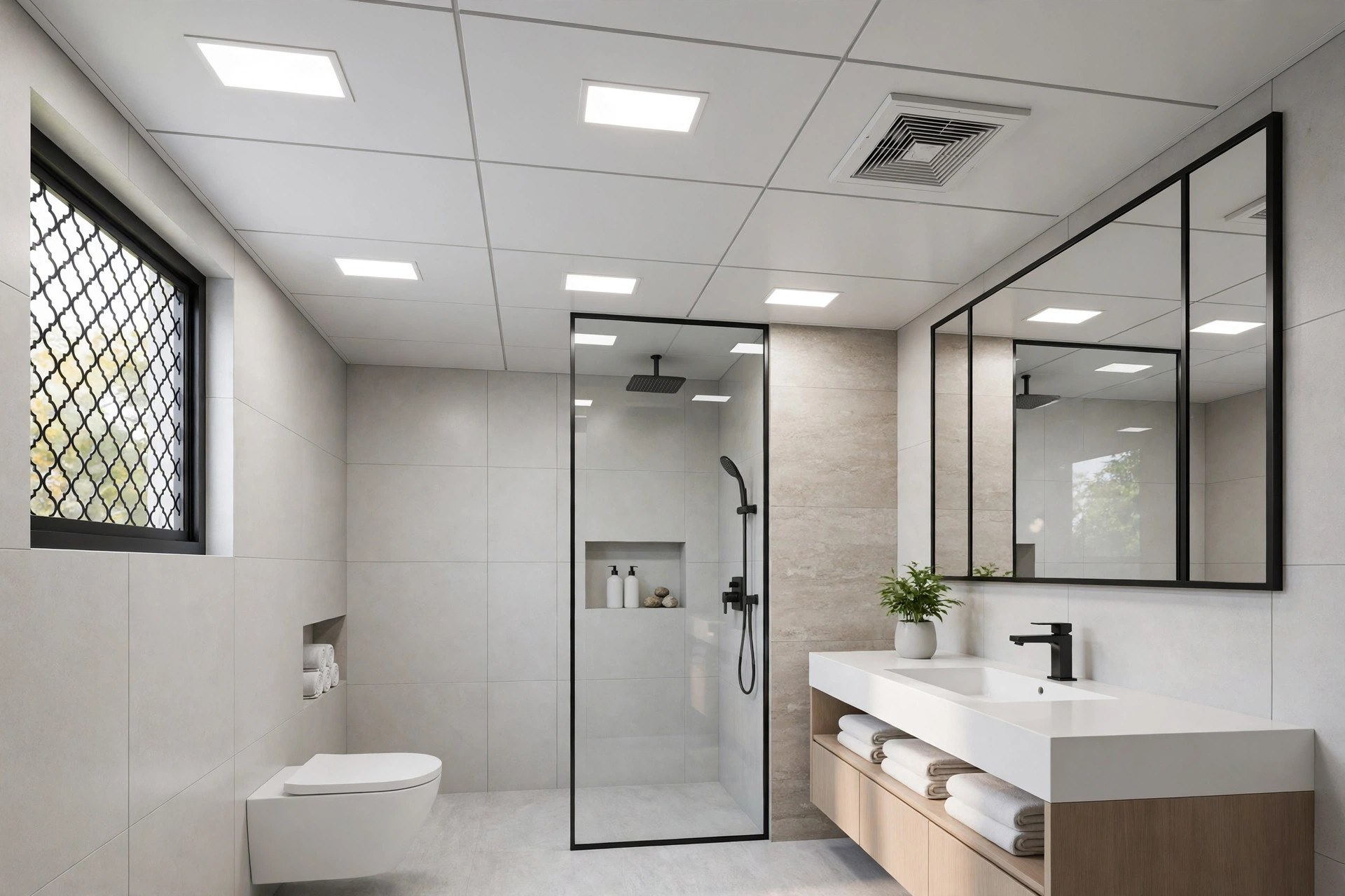 Modern bathroom with white powder-coated aluminium panel ceiling, downlights and exhaust vent