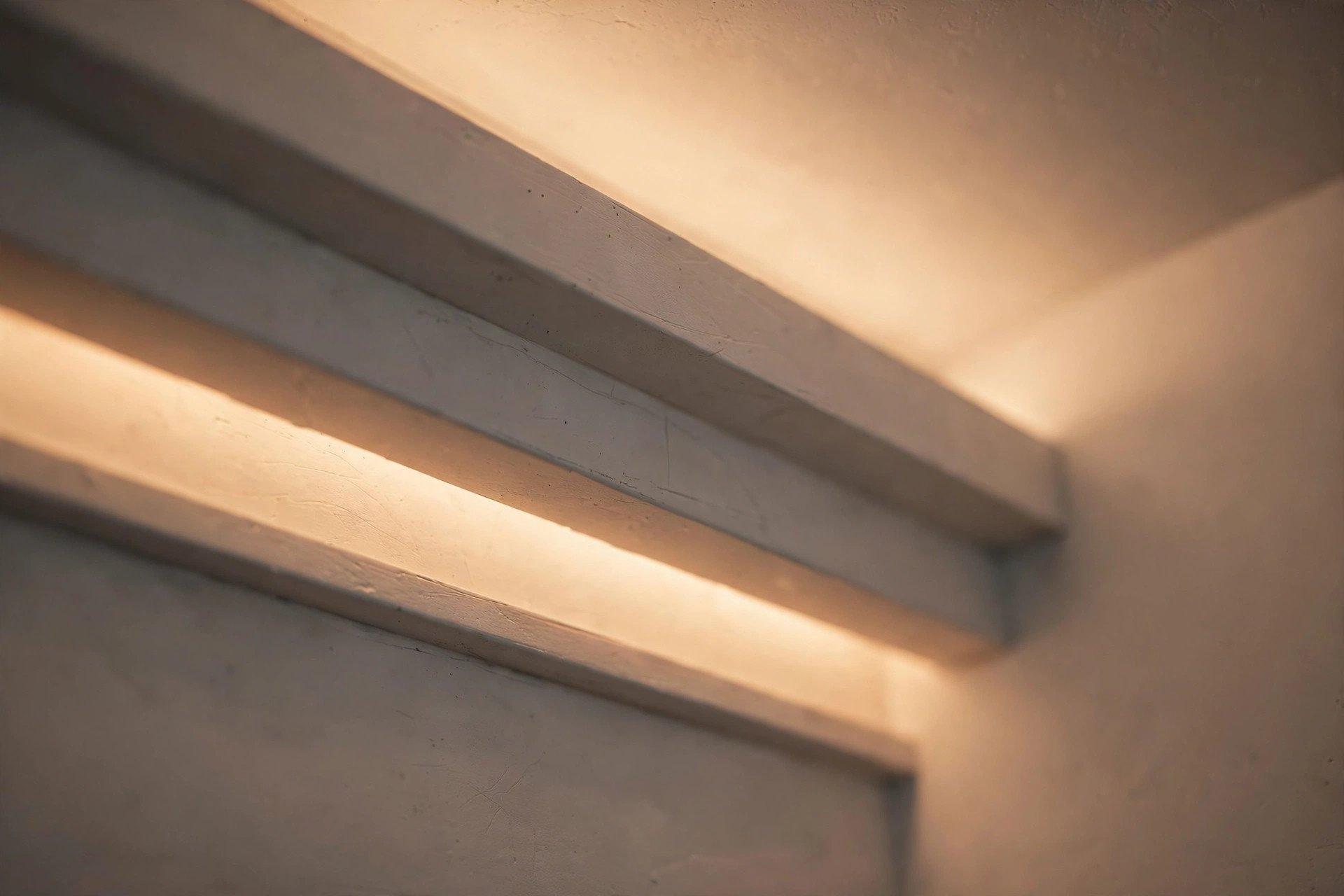 Close-up concept render of a tray ceiling corner with a warm LED strip glowing inside the stepped ledge