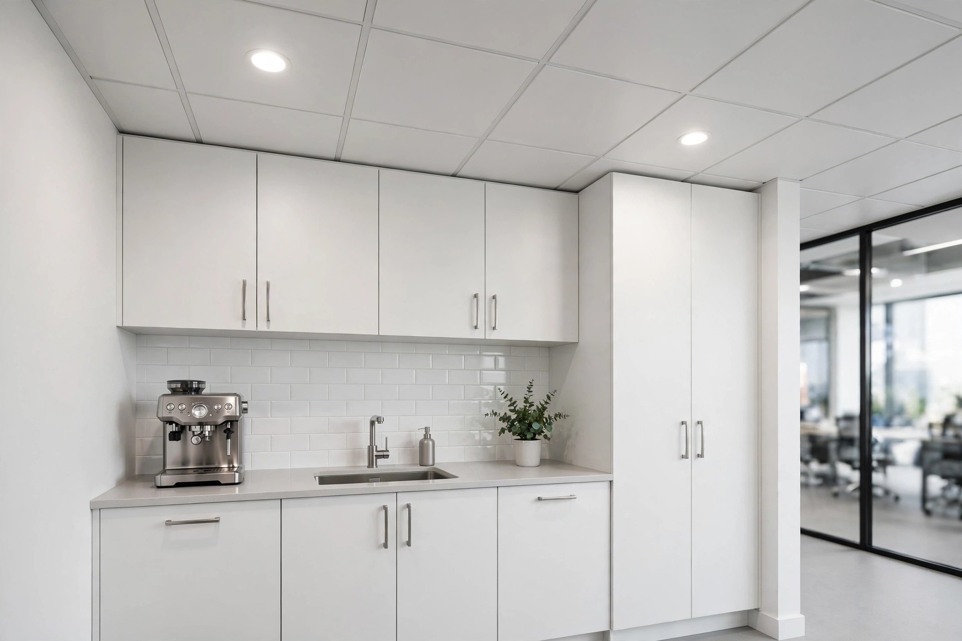 Office pantry with a wipeable PVC panel ceiling and simple recessed lights